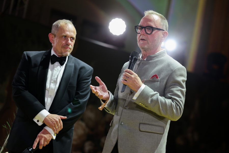 amfAR Gala Salzburg 2025: Gery Keszler and Kevin Robert Frost, CEO, amfAR speak onstage during the amfAR Gala Salzburg, (Photo by Gerald Matzka/Getty Images)
